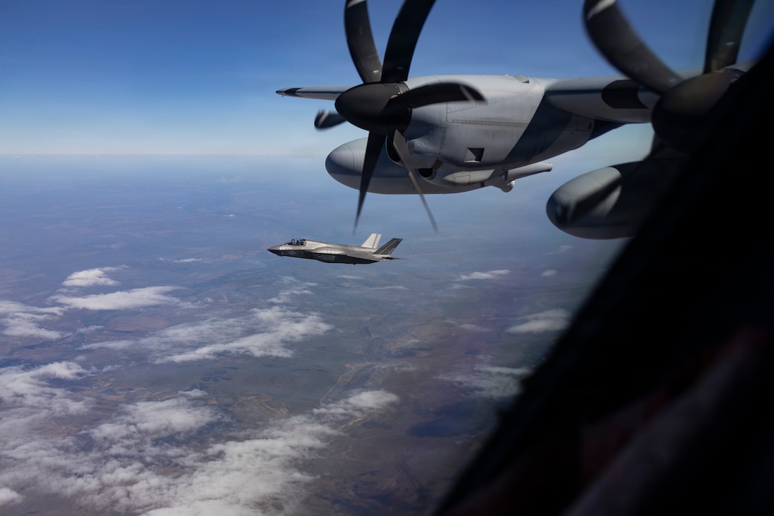 A U.S. Marine Corps F-35B Lightning II assigned to Marine Fighter Attack Squadron (VMFA) 214, Marine Aircraft Group 13, 3rd Marine Aircraft Wing, departs after receiving fuel from a KC-130J Hercules assigned to Marine Aerial Refueler Transport Squadron (VMGR) 352, MAG-11, 3rd MAW as part of exercise Slingshot above Darwin, Australia, June 24, 2026.