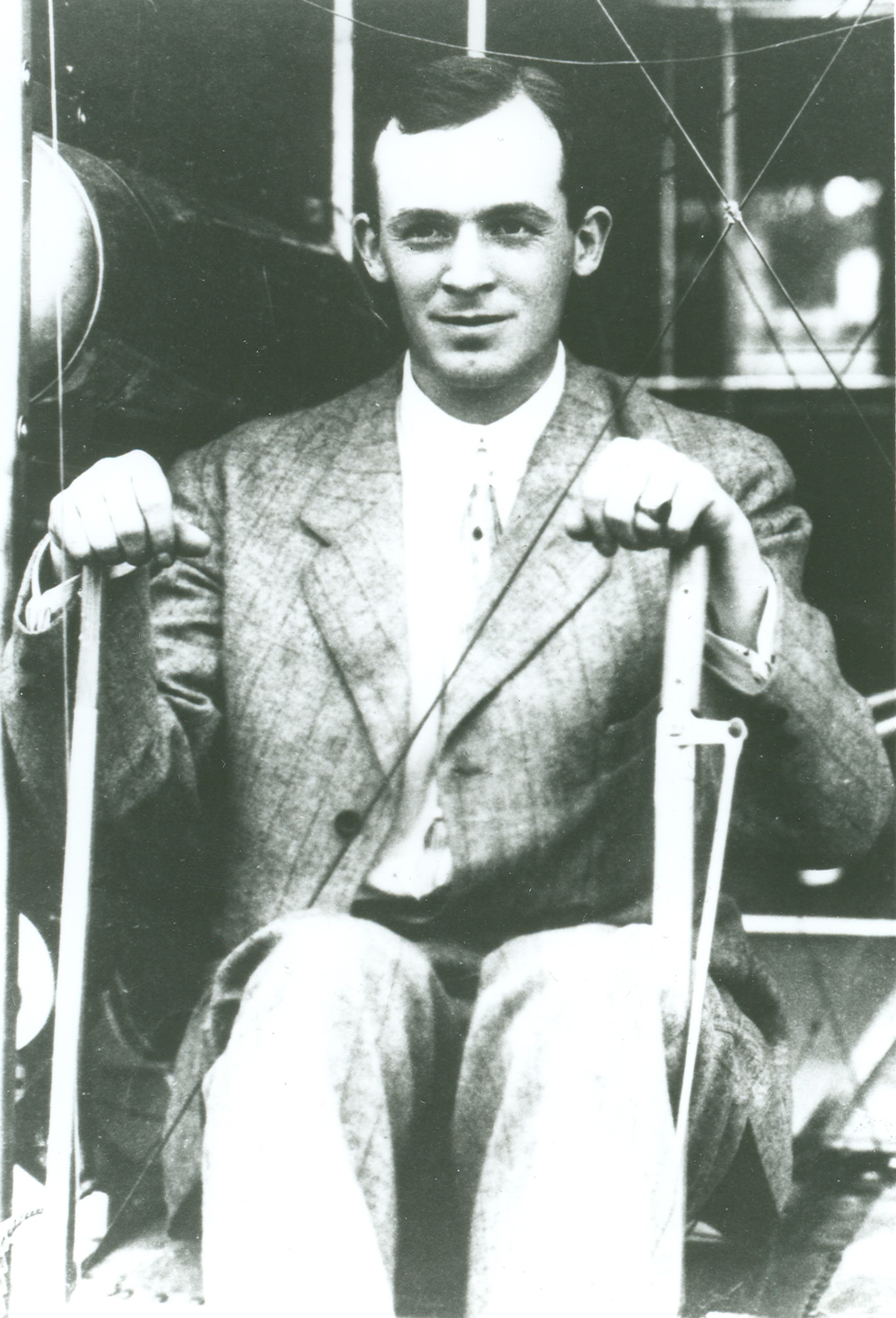 Henry Arnold sitting at the controls of a Type B two-seater Wright plane while learning to fly under instructions of the Wright brothers at their school in Dayton, Ohio, in 1911. After extensive training on the ground, he made his first flight for 7 minutes. (U.S. Air Force photo)