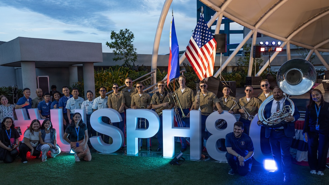 U.S. Marines with the Marine Corps Forces Pacific Band, members of the Armed Forces of the Philippines General Headquarters band, and personnel from the U.S. Embassy pose for a photo after a concert in celebration of Freedom 250 at the SM Mall of Asia, Manila, Philippines, June 28, 2026.