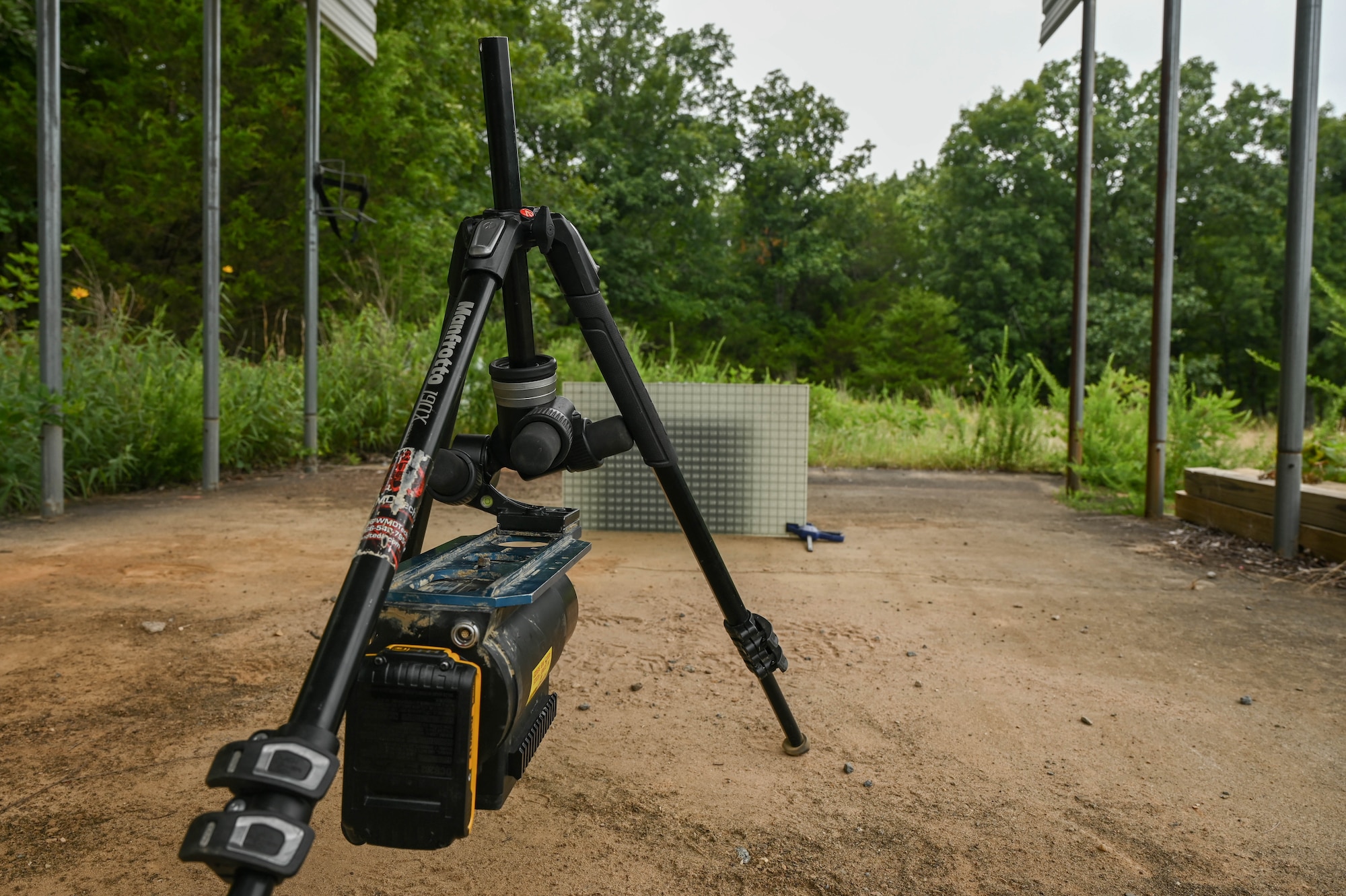 A specialized tool sits on the ground