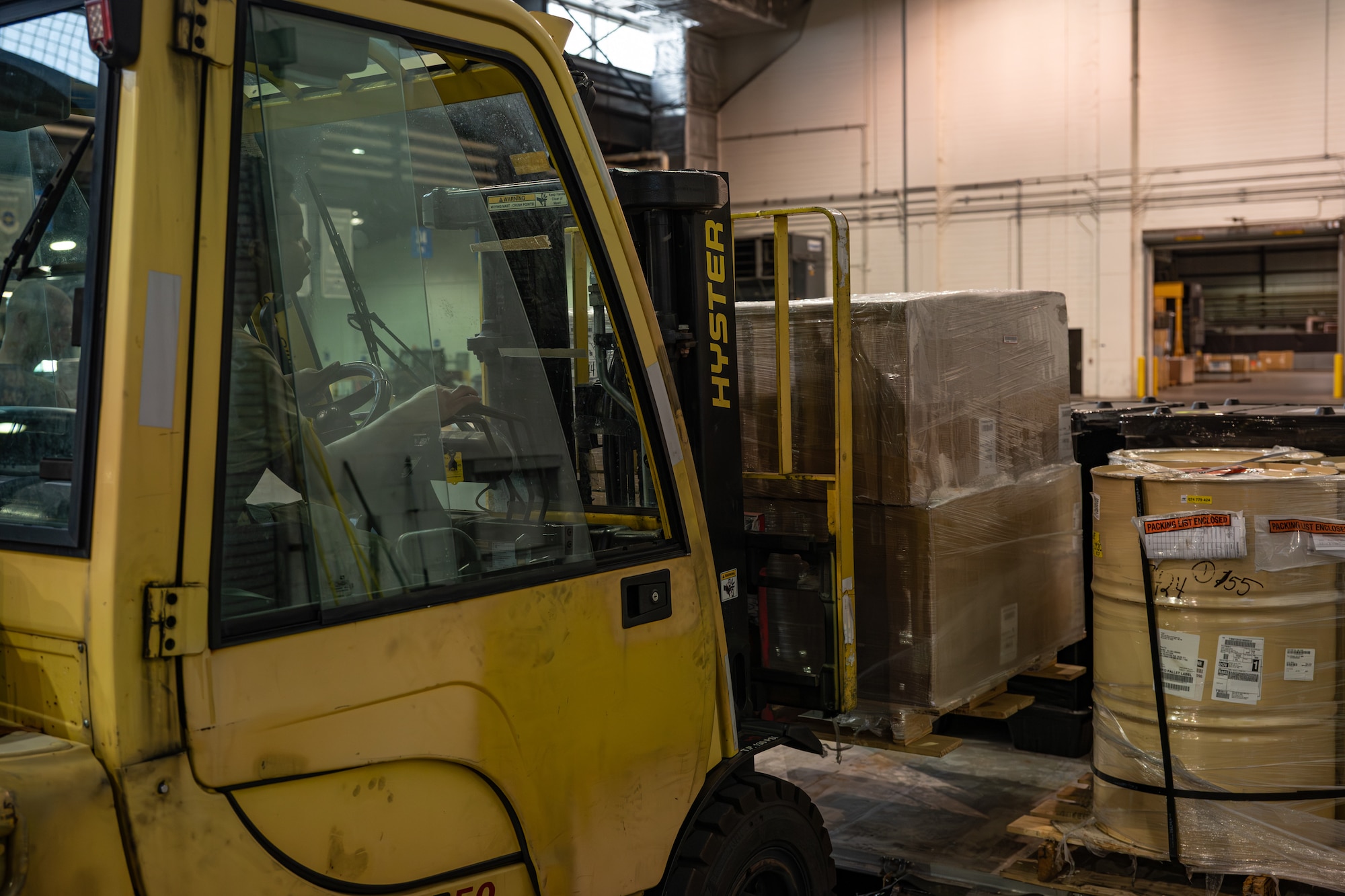 U.S. Air Force Airman 1st Class Kimberly Webb Brown Floyd, 436th Aerial Port Squadron cargo processor, uses a forklift to move cargo onto a pallet on Dover Air Force Base, Delaware, June 24, 2026.