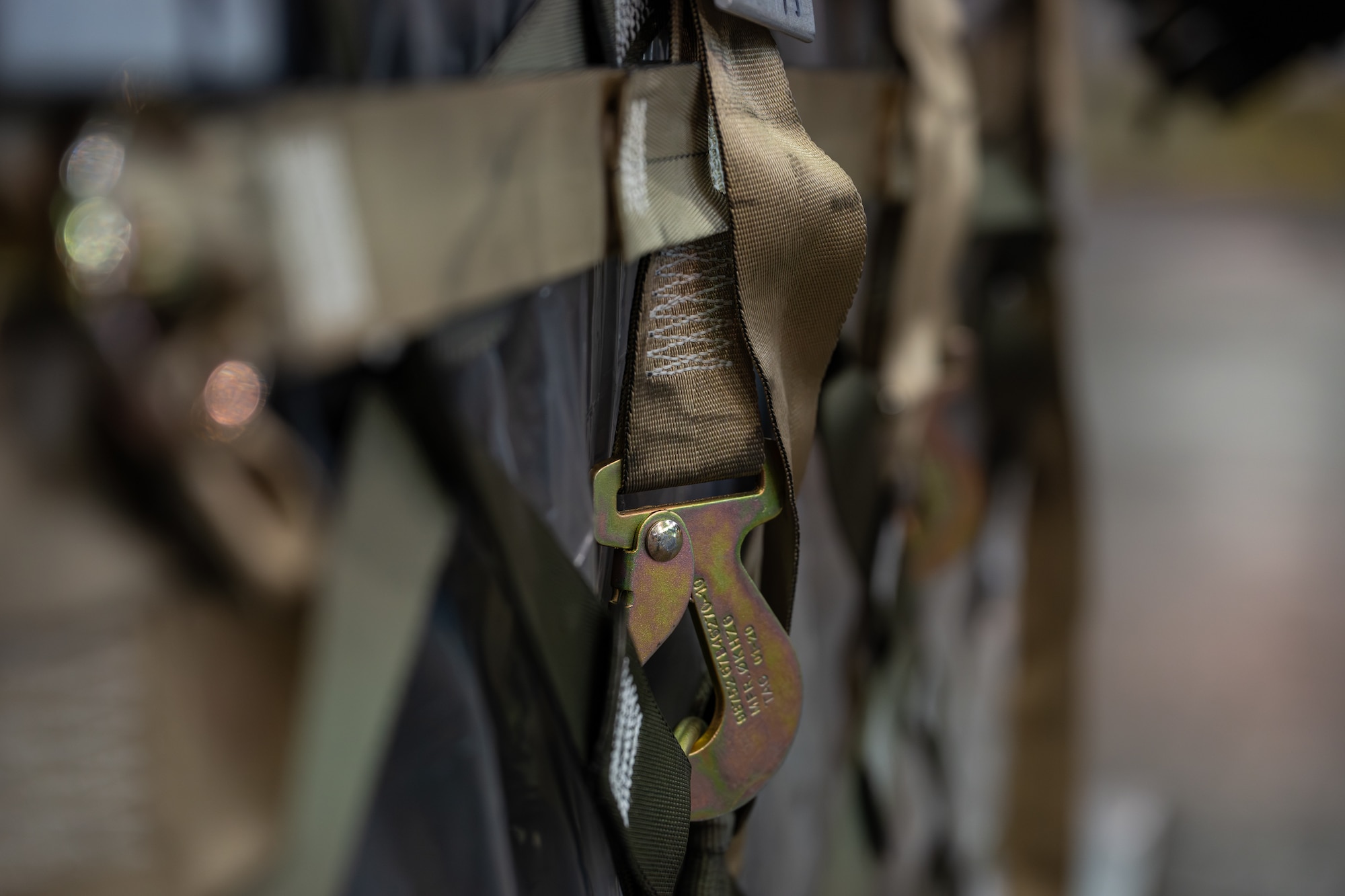 Straps are tightly secured around a cargo pallet inside a cargo bay on Dover Air Force Base, Delaware, June 24, 2026.