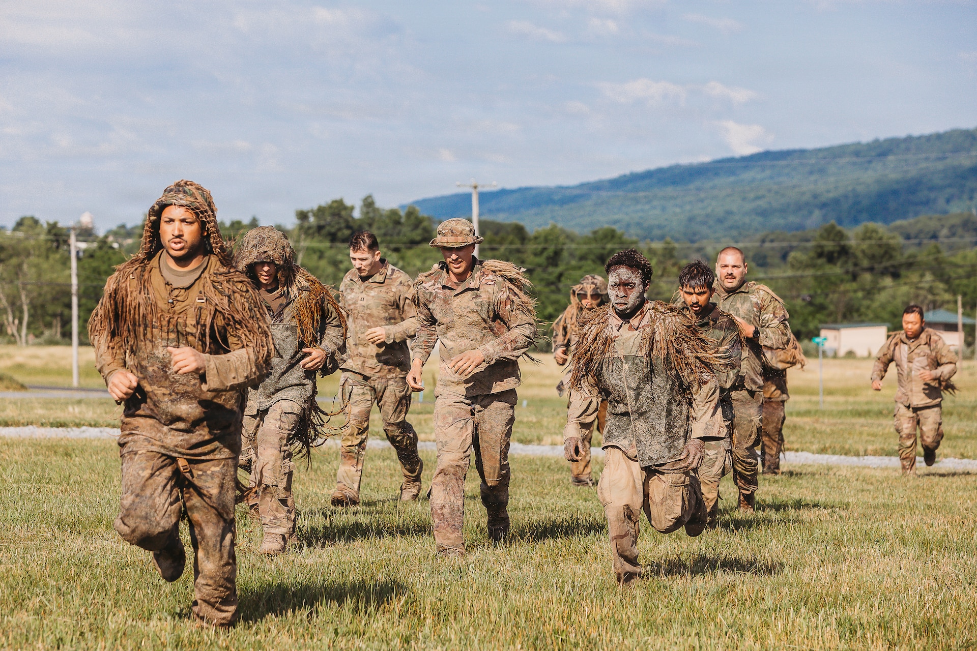 U.S. Army Soldiers with the Recon Section of the Multi-Purpose Company, 1st Battalion, 112th Infantry Regiment, 56th Mobile Brigade Combat Team, 28th Infantry Division conduct a ghillie wash training event June 25, 2026, at Fort Indiantown Gap, Pennsylvania. (U.S. Army National Guard photo by Staff Sgt. Jonathan Campbell)