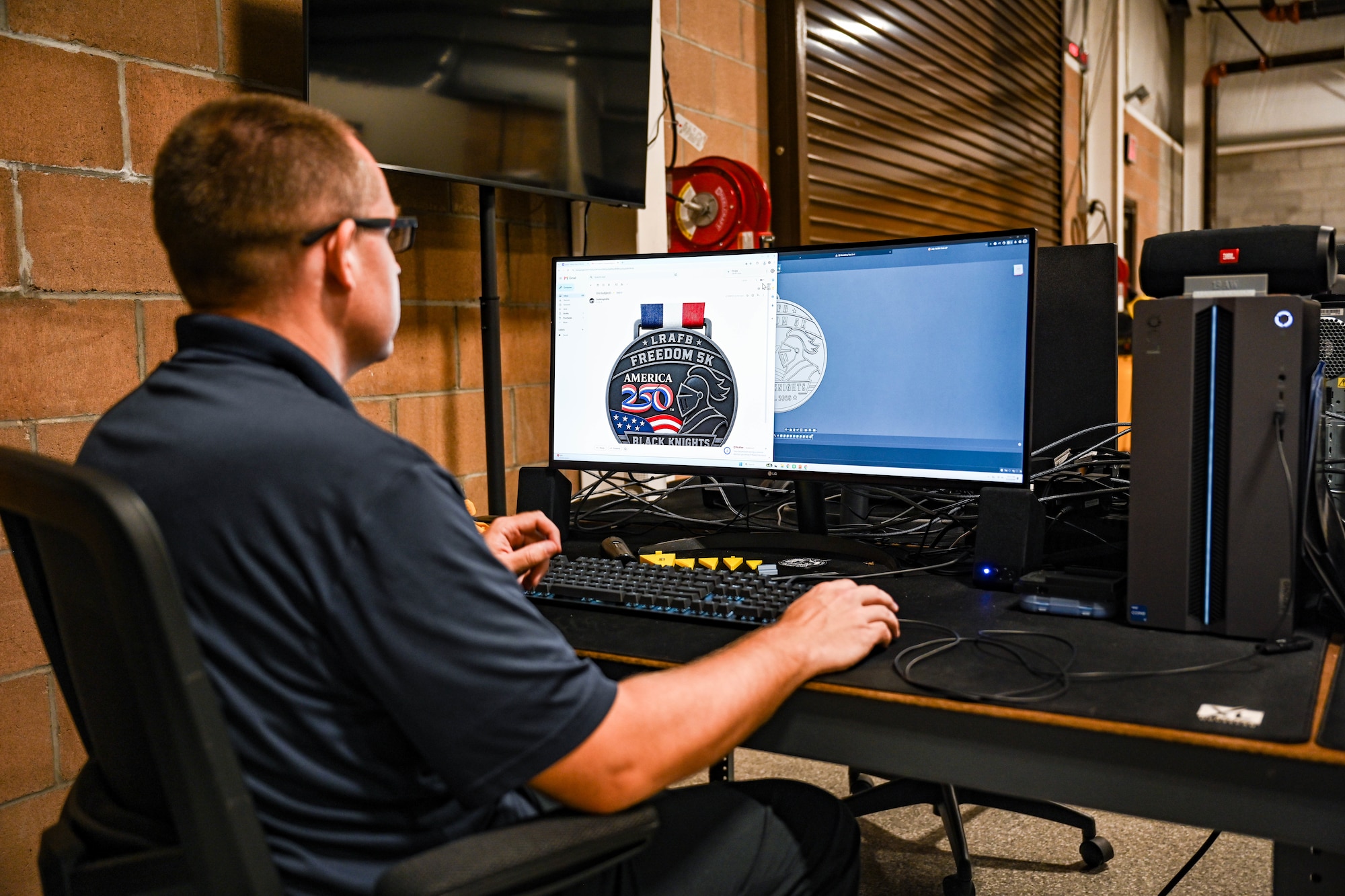 A man uses a computer.