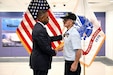 Army Reserve Ambassador Phillip Churn Sr., a retired major general, presents Specialist Fourth Class Raymond Steven Williams with the Purple Heart and citation at the Pentagon, Washington, D.C., June 17, 2026. Williams was wounded in action in the Republic of Vietnam on Dec. 31, 1968.