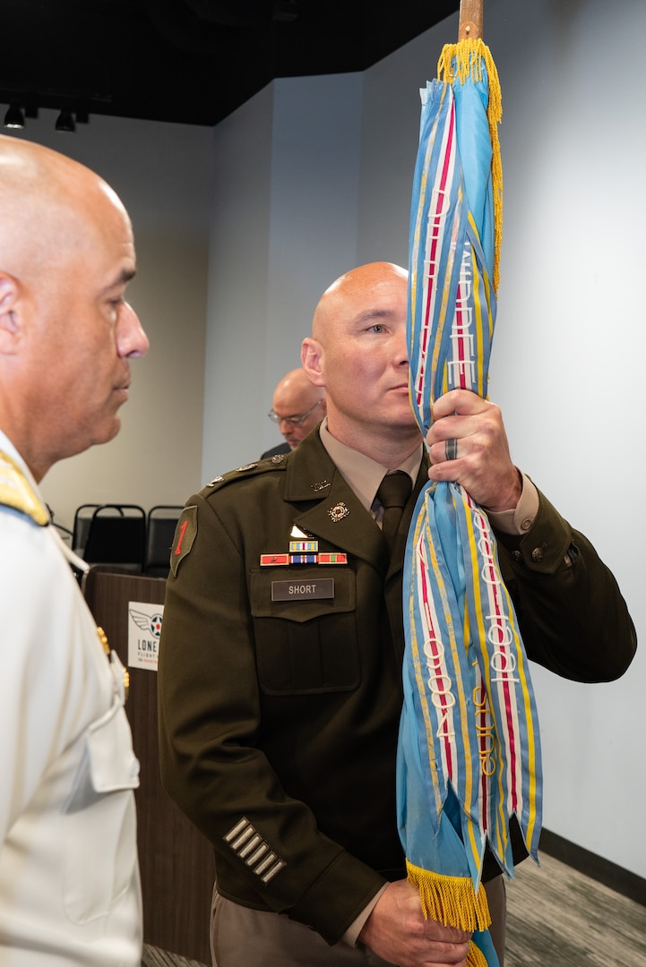 people holding flags, or speaking