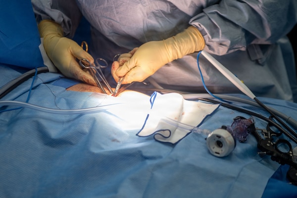 U.S. Navy Lt. Cmdr. Carina Felix, Ship’s Surgeon, performs surgery aboard Nimitz-class aircraft carrier USS Dwight D. Eisenhower (CVN 69), June 22, 2026. Eisenhower is underway in the Atlantic Ocean conducting carrier qualifications, supporting East Coast Fleet Replacement Squadrons. (U.S. Navy photo by Mass Communication Specialist 3rd Class Evan Antonisse)