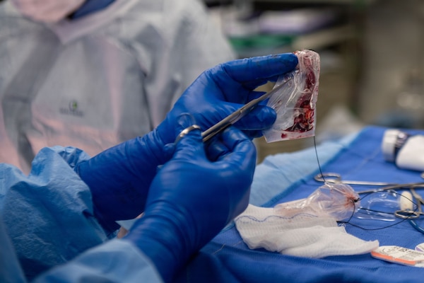 U.S. Navy Hospital Corpsman 3rd Class Nicholas Muller handles surgical waste aboard Nimitz-class aircraft carrier USS Dwight D. Eisenhower (CVN 69), June 22, 2026. Eisenhower is underway in the Atlantic Ocean conducting carrier qualifications, supporting East Coast Fleet Replacement Squadrons. (U.S. Navy photo by Mass Communication Specialist 3rd Class Evan Antonisse)