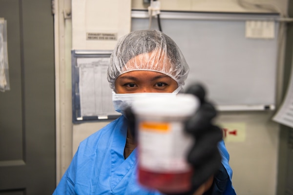 U.S. Navy Hospital Corpsman 2nd Class Regine Hizon poses for a photo aboard Nimitz-class aircraft carrier USS Dwight D. Eisenhower (CVN 69), June 22, 2026. Eisenhower is underway in the Atlantic Ocean conducting carrier qualifications, supporting East Coast Fleet Replacement Squadrons. (U.S. Navy photo by Mass Communication Specialist 3rd Class Evan Antonisse)