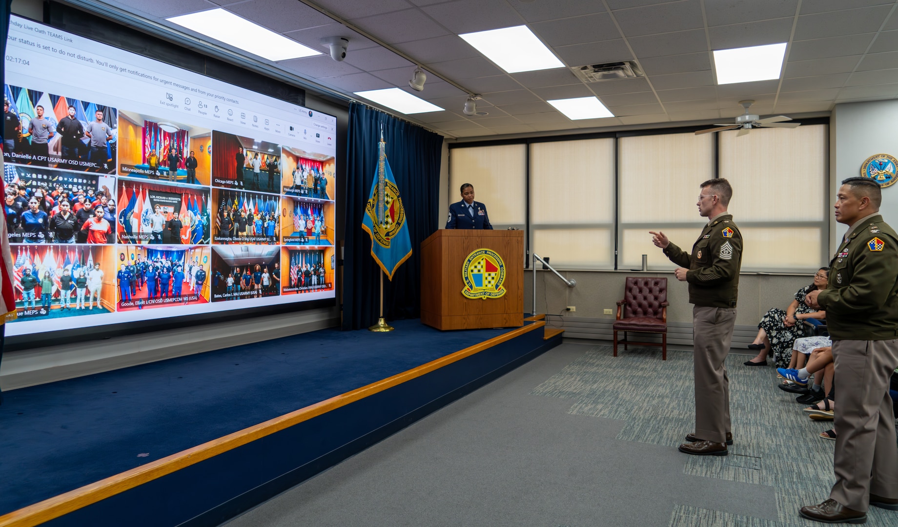 Army Col. Frankie Cochiaosue, U.S. Military Entrance Processing Command commander, and Army Command Sgt. Maj. Gary Krese, USMEPCOM senior enlisted advisor, address applicants prior to conducting a virtual Oath of Enlistment across 12 Military Entrance Processing Stations on July 1, 2026. The event is part of USMEPCOM’s 50th birthday celebration, recognizing five decades of excellence in supporting the nation’s military accession mission.
