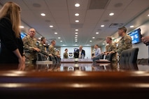 Secretary of the Air Force Troy Meink and leaders from the 5th Bomb Wing and 91st Missile Wing gather for a combined mission brief during a visit at Minot Air Force Base, North Dakota, June 29, 2026. During the visit, base leadership and Meink discussed initiatives that will enhance operational readiness and reinforce the Air Force's ability to deter potential adversaries. (U.S. Air Force photo by Senior Airman Wesley Davies)