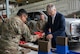 U.S. Air Force Tech. Sgt. Kelvin Moreno, 91st Missile Wing Atomic Spark innovation co-director, shows Secretary of the Air Force Troy Meink a 3-D printed firearm magazine loader during a visit at Minot Air Force Base, North Dakota, June 29, 2026. The modernization of Minot AFB’s legacy Minuteman III infrastructure is one of Meink’s main priorities. Minot AFB is responsible for 15 missile alert facilities and 150 Minuteman III missiles located across roughly 8,000 square miles. (U.S. Air Force photo by Senior Airman Wesley Davies)