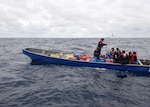Legend-class national security cutter USCGC Kimball (WMSL 756) crew members interdict a go-fast vessel at sea resulting in the seizure of approximately 2,138 pounds of contraband, worth an estimated $10 million while patrolling the Eastern Pacific Ocean, June 7, 2026. Kimball's crew facilitated the transfer of contraband and suspected smugglers to Panama’s National Aeronaval Service (SENAN) for further disposition (U.S. Coast Guard photo by Petty Officer 1st Class Michael Maust).