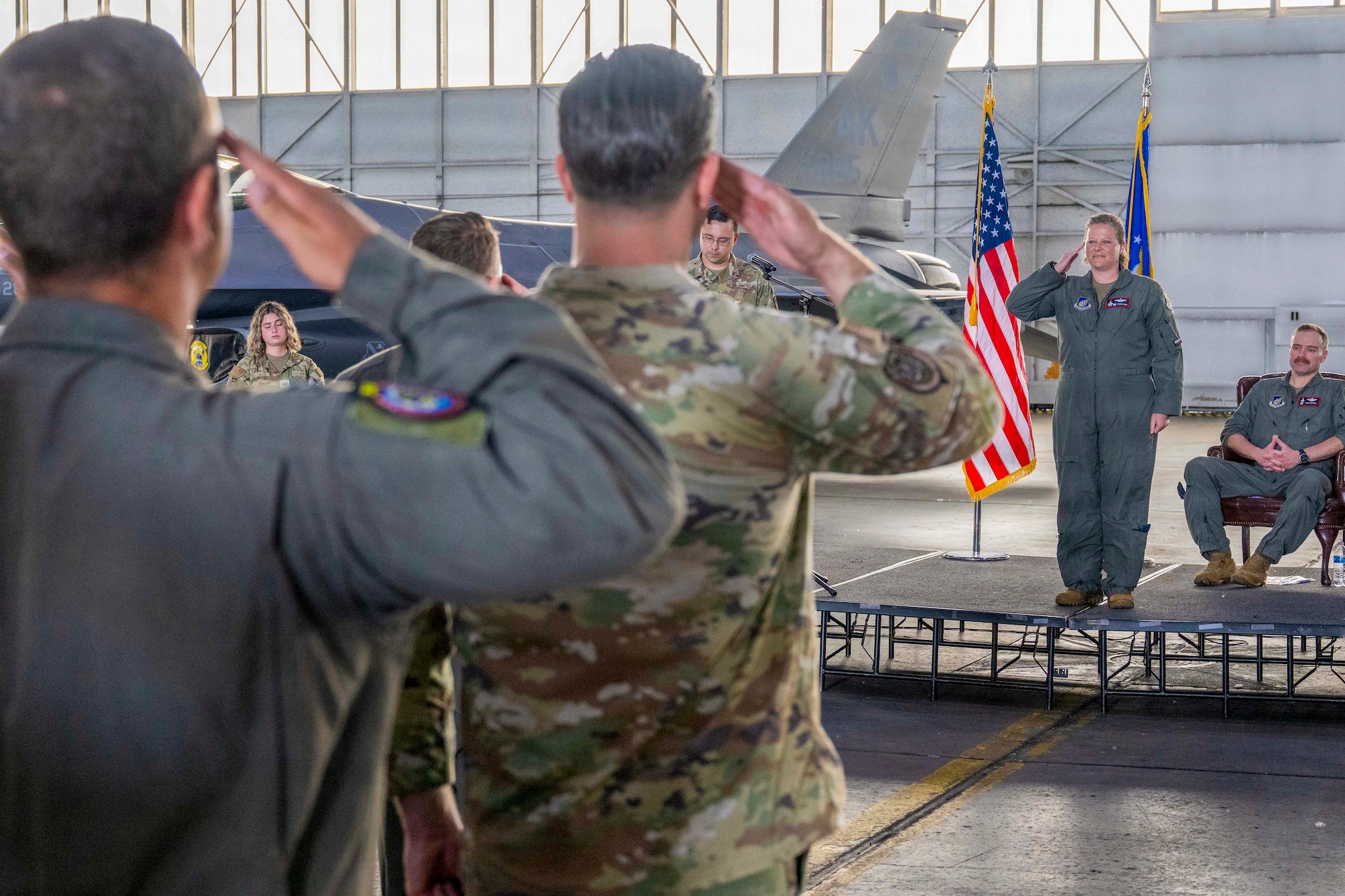 U.S. Air Force Maj. Nikkin Yogi, 353rd Combat Training Squadron commander, renders her first salute to members of the 353rd CTS during a change of command ceremony at Eielson Air Force Base, Alaska, June 26, 2026.