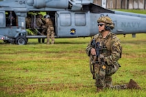 U.S. Army Sgt. 1st Class Alan San Nicolas of the Guam National Guard, assigned to Task Force Talon, 38th Air Defense Artillery Brigade, pulls security for a U.S. Navy SH-60 Seahawk during a joint medical evacuation and Air Assault tactical training event on Guam, May 26, 2026.