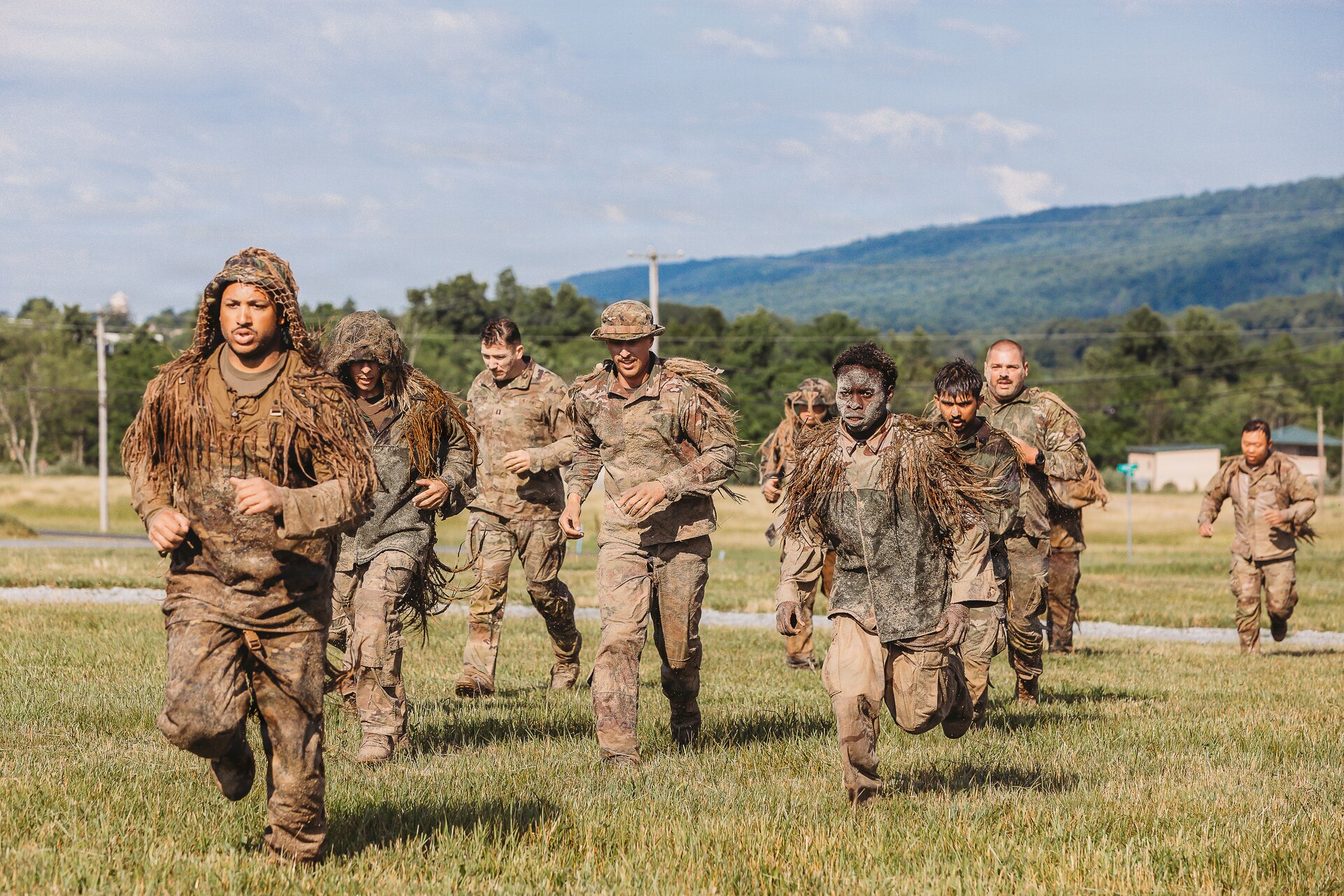 U.S. Army Soldiers with the Recon Section of the Multi-Purpose Company, 1st Battalion, 112th Infantry Regiment, 56th Mobile Brigade Combat Team, 28th Infantry Division conduct a ghillie wash training event June 25, 2026, at Fort Indiantown Gap, Pennsylvania. (U.S. Army National Guard photo by Staff Sgt. Jonathan Campbell)