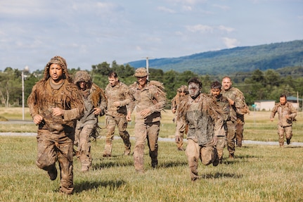 U.S. Army Soldiers with the Recon Section of the Multi-Purpose Company, 1st Battalion, 112th Infantry Regiment, 56th Mobile Brigade Combat Team, 28th Infantry Division conduct a ghillie wash training event June 25, 2026, at Fort Indiantown Gap, Pennsylvania. (U.S. Army National Guard photo by Staff Sgt. Jonathan Campbell)
