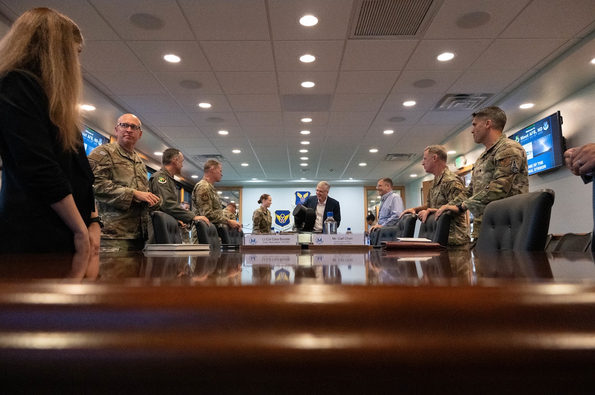 Secretary of the Air Force Troy Meink and leaders from the 5th Bomb Wing and 91st Missile Wing gather for a combined mission brief during a visit at Minot Air Force Base, North Dakota, June 29, 2026. During the visit, base leadership and Meink discussed initiatives that will enhance operational readiness and reinforce the Air Force's ability to deter potential adversaries. (U.S. Air Force photo by Senior Airman Wesley Davies)