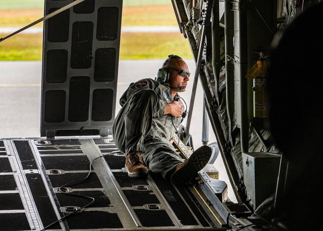 U.S. Air Force Tech. Sgt. Eric Skaggs, a loadmaster assigned to the 123rd Airlift Wing, Kentucky Air National Guard, surveys the ramp after a C-130J Super Hercules lands at Esbjerg Airport, Denmark, during exercise Ramstein Flag on June 18, 2026. The 123rd AW is providing tactical airlift to NATO Allies throughout the month of June for the Allied Air Command event, a large-scale, multi-location and joint operating area exercise with 18 participating nations and more than 200 aircraft. (U.S. Air National Guard photo by Senior Airman Annaliese Billings)