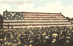 A photo that shows 2,500 children arranged in a formation of the American flag