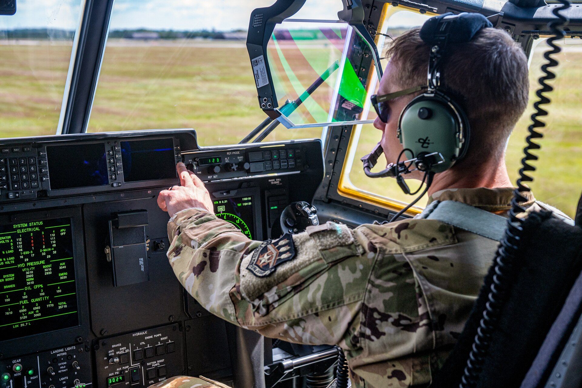 U.S. Air Force Capt. Phil Woods, a pilot assigned to the 123rd Airlift Wing, Kentucky Air National Guard, adjusts the controls of a C-130J Super Hercules aircraft prior to departure from Karup Air Base, Denmark for Esbjerg, Denmark, on June 18, 2026, in support of Ramstein Flag. The 123rd AW is providing tactical airlift to NATO Allies throughout the month of June for the Allied Air Command event, a large-scale, multi-location and joint operating area exercise with 18 participating nations and more than 200 aircraft. (U.S. Air National Guard photo by Senior Airman Annaliese Billings)