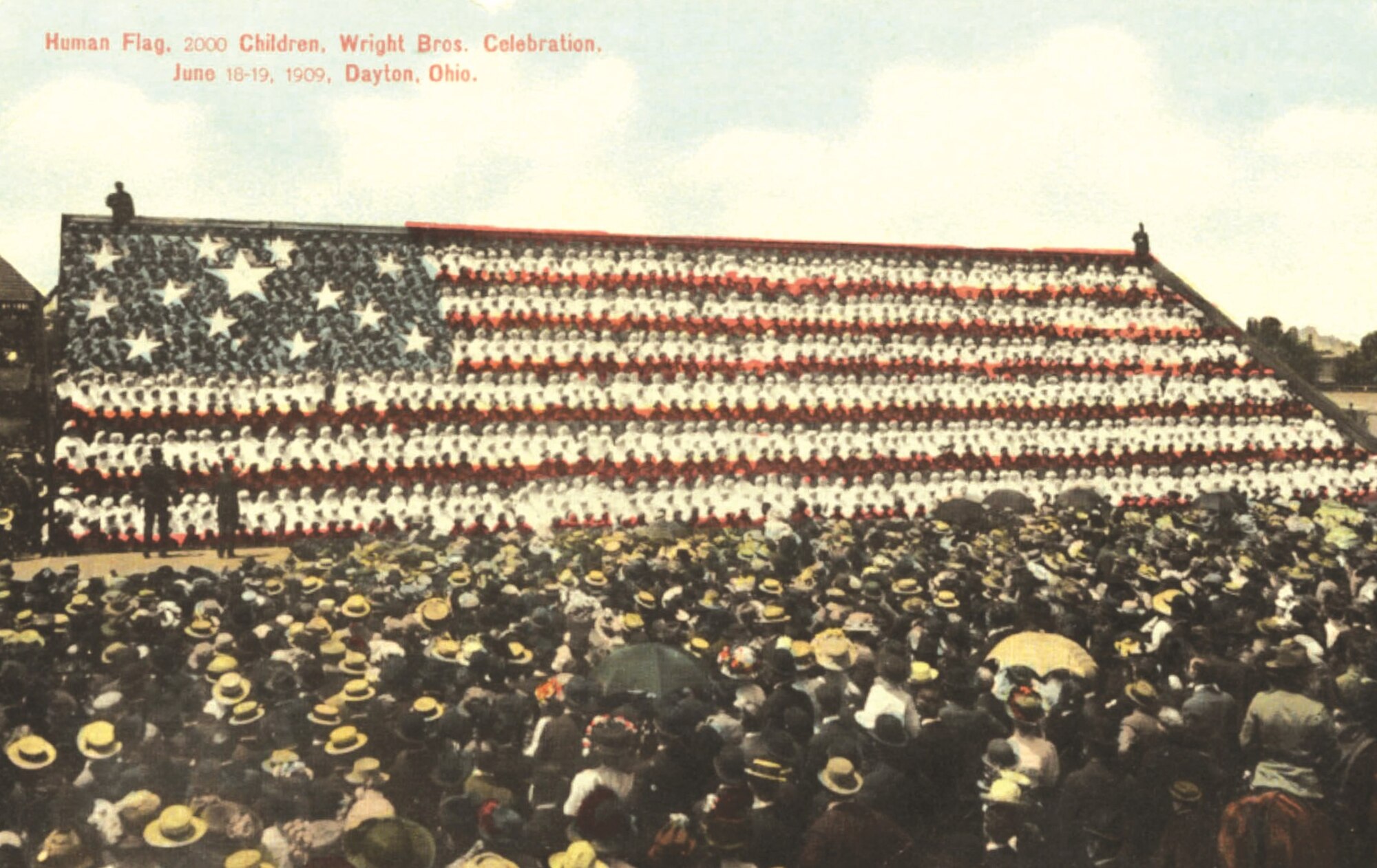 A photo that shows 2,500 children arranged in a formation of the American flag