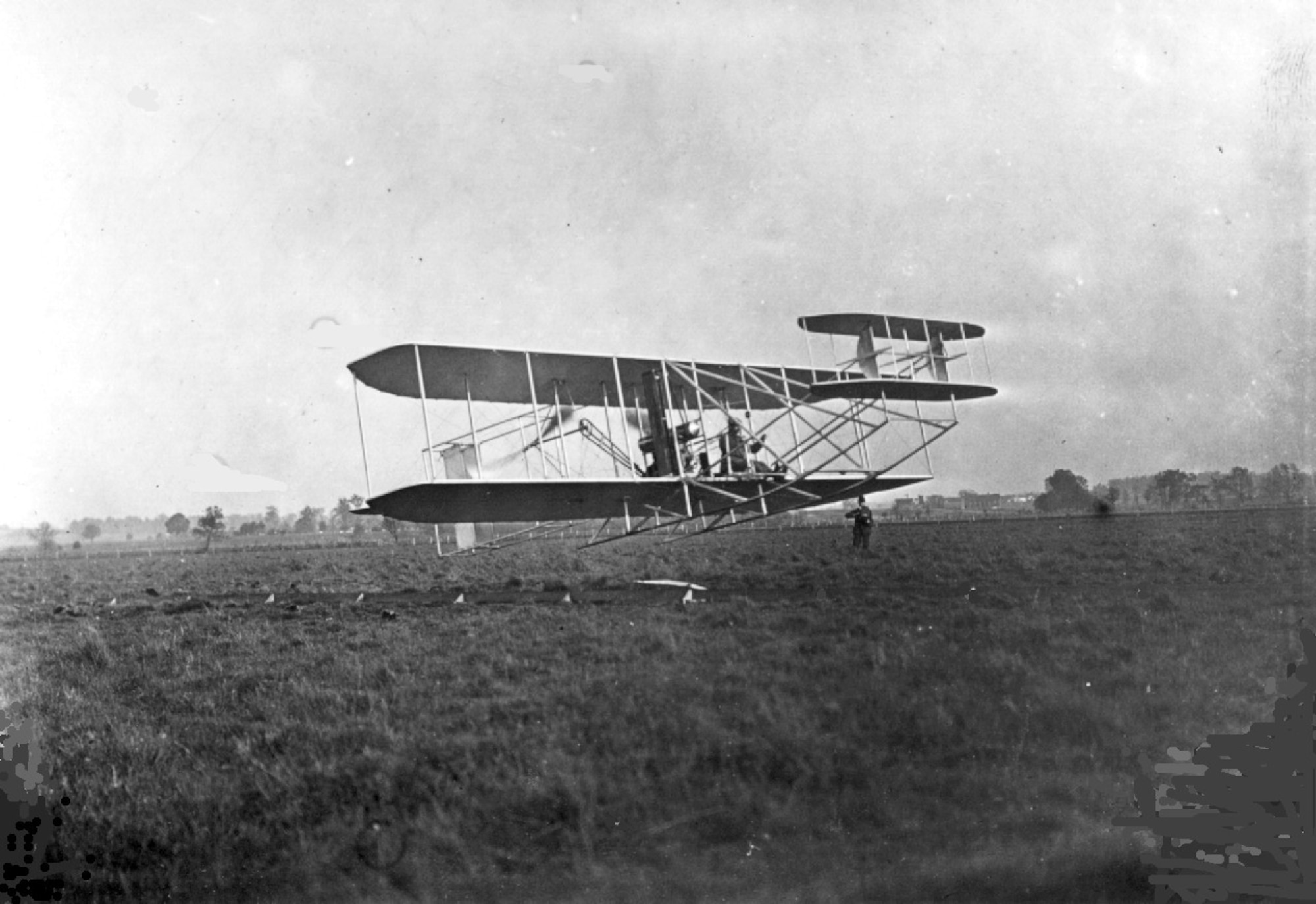 A black and white photo of the Wright Brother's Model A Flyer
