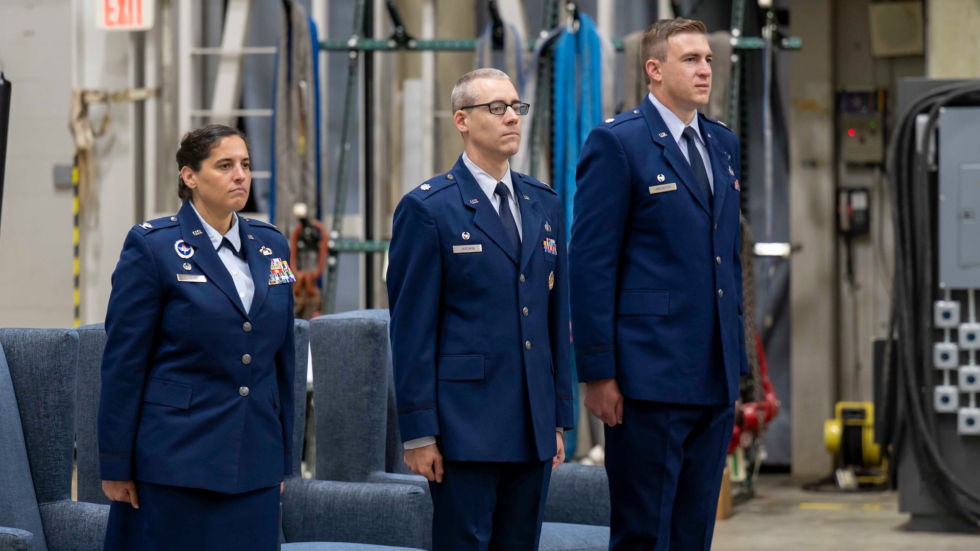 From left, Col. Paola Ondina, Lt. Col. Robert Jaromin and Lt. Col. James Lancaster stand at attention during GXF’s change of command ceremony.