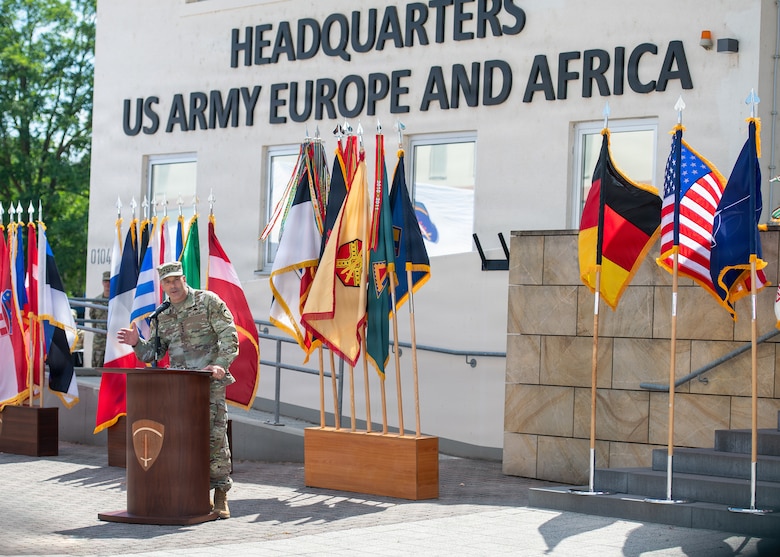 U.S. Army Gen. Christopher Donahue delivers remarks during his relinquishment of command ceremony July 2, 2026, at Clay Kaserne in Wiesbaden, Germany. During his tenure, Donahue led efforts to develop and scale the Eastern Flank Deterrence Initiative, a transformational warfighting concept designed to integrate land forces in support of NATO's regional defense plans. (U.S. Army photo by Susanne Goebel)