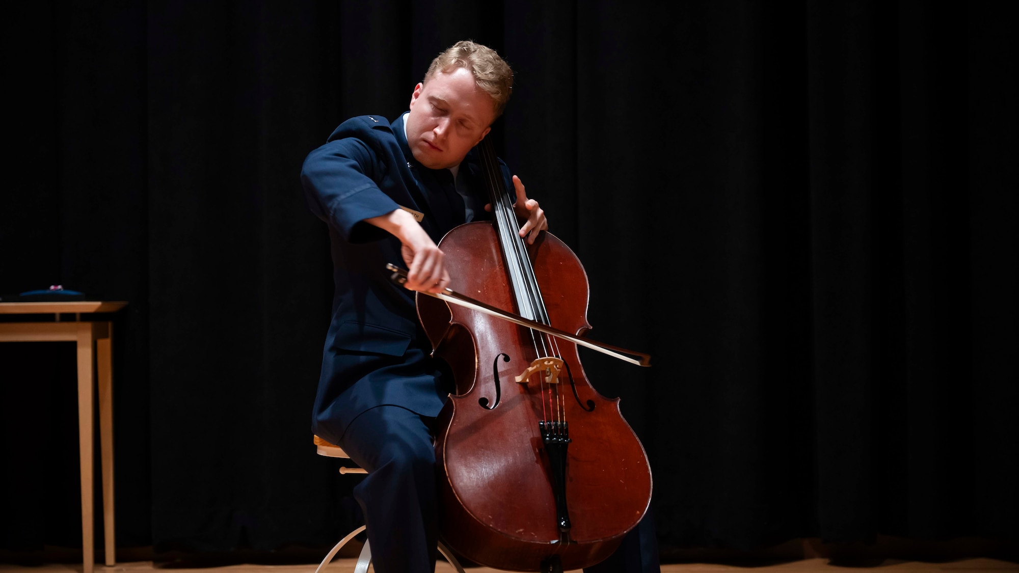 First Lt. Max Ellswoth plays the cello during the Signals Analysis Squadron change of command ceremony.