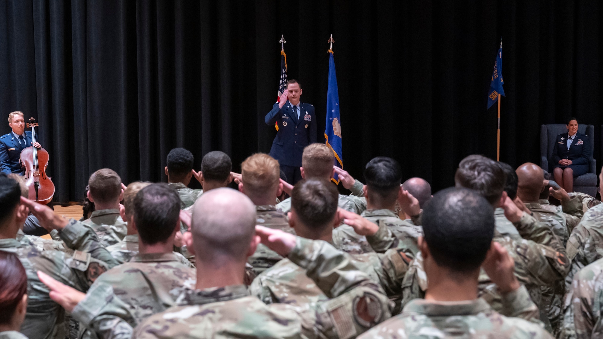 Lt. Col. Mason Workman renders his first salute to the GXS squadron during a change of command ceremony.