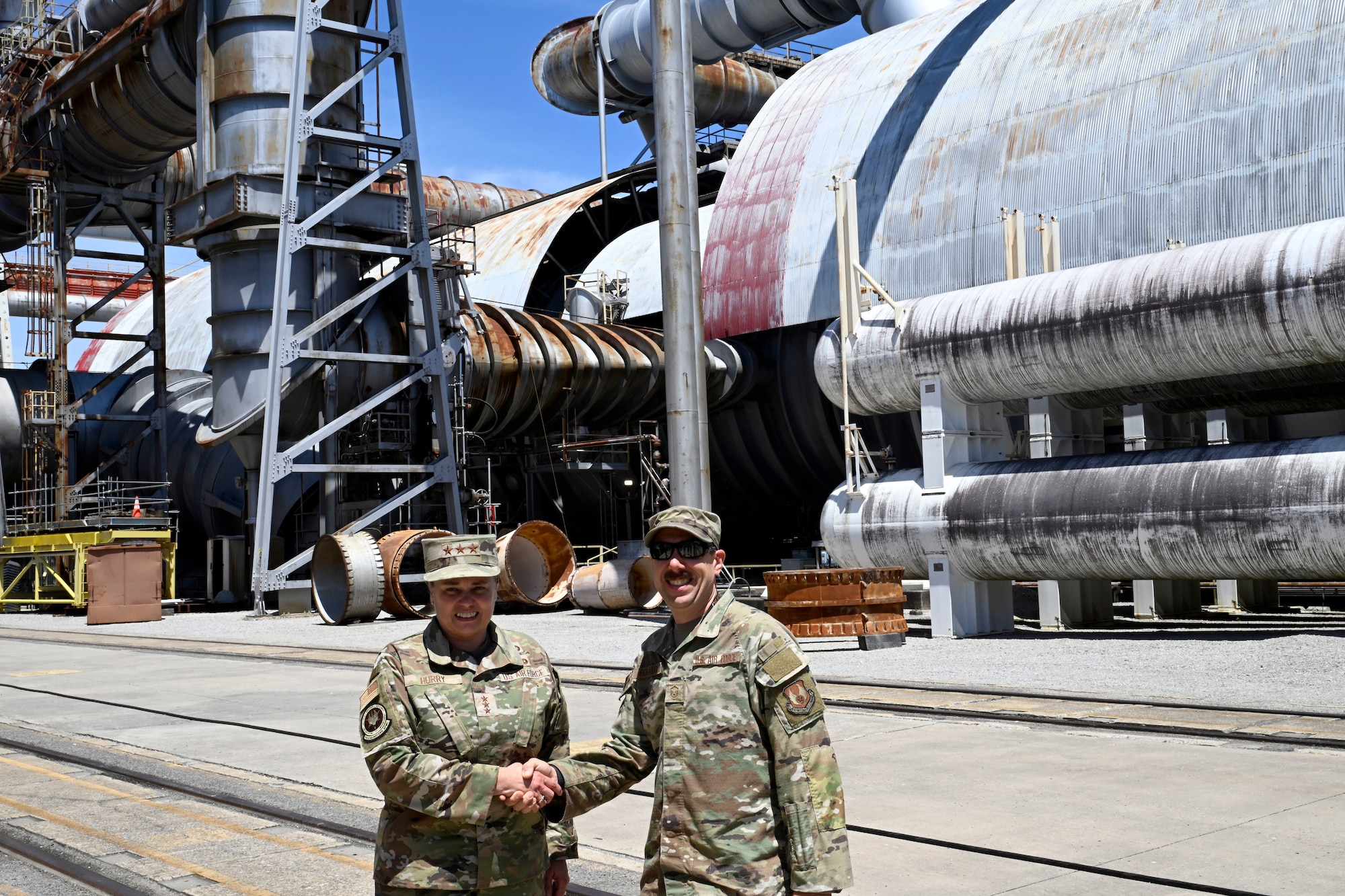Lt. Gen. Linda Hurry, commander of Air Force Materiel Command, shakes hands with Master Sgt. Gregg Rosado, aerospace propulsion specialist, after presenting Darnell with an AFMC Challenge Coin during a May 15, 2026, visit to Arnold Air Force Base, Tenn., headquarters of Arnold Engineering Development Complex. During her visit, Hurry toured facilities, received briefs and recognized several members of the AEDC workforce. AEDC is a unit of the Air Force Test Center, which is a unit of AFMC. (U.S. Air Force photo by Brad Hicks)