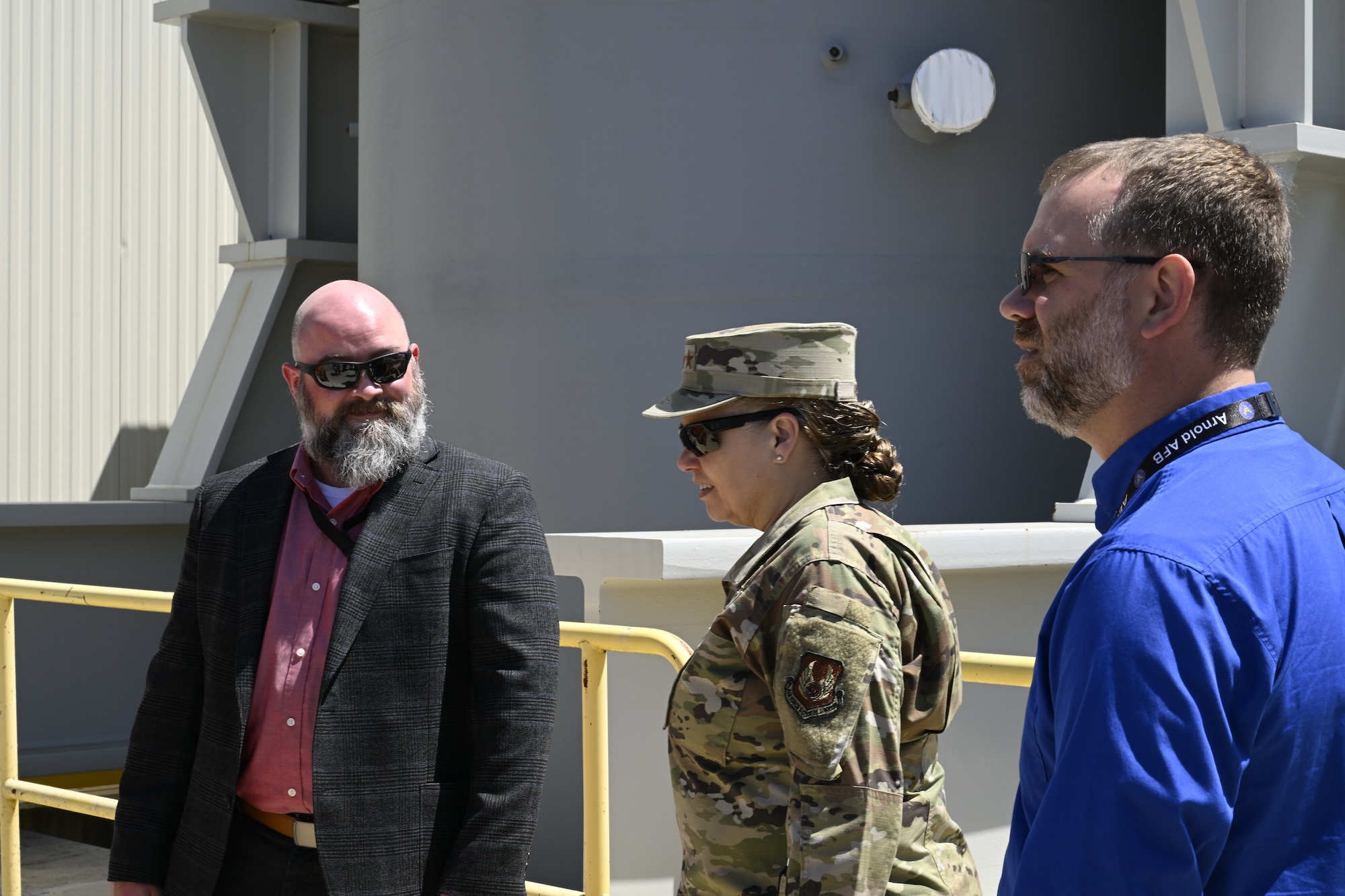 Lt. Gen. Linda Hurry, commander of Air Force Materiel Command, tours the J-5 test facility at Arnold Air Force Base during a May 15, 2026, visit to Arnold AFB, Tenn., headquarters of Arnold Engineering Development Complex. Pictured with Hurry are Sean Smith, 715th Test Squadron technical director, left, and Kirk Butler, aeropropulsion subject matter expert. AEDC is a unit of the Air Force Test Center, which is a unit of AFMC. (U.S. Air Force photo by Brad Hicks)