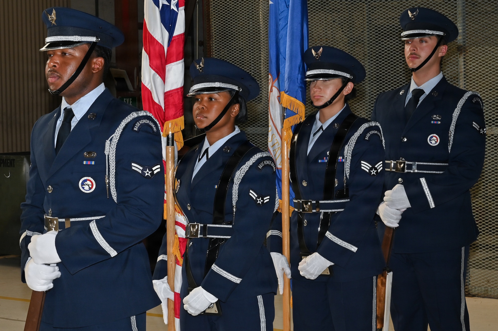 Members of the Kirtland Air Force Base Honor Guard prepare to present the colors at the Kirtland Medical Group change of command ceremony at Kirtland Air Force Base.