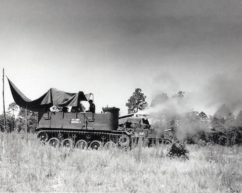 FORT STEWART, Ga. July 1958 - An M37 Gun Motor Carriage assigned to the 48th Armored Division Artillery fires a 105 mm round during annual training.