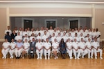 The Naval Medical Center Camp Lejeune Graduate Medical Education Directorate is pictured at the Family Medicine Residency and Sports Medicine Fellowship graduation ceremony on June 30, 2026. The program graduated 10 family medicine residents, 12 family medicine interns, and two sports medicine fellows for Navy Medicine.