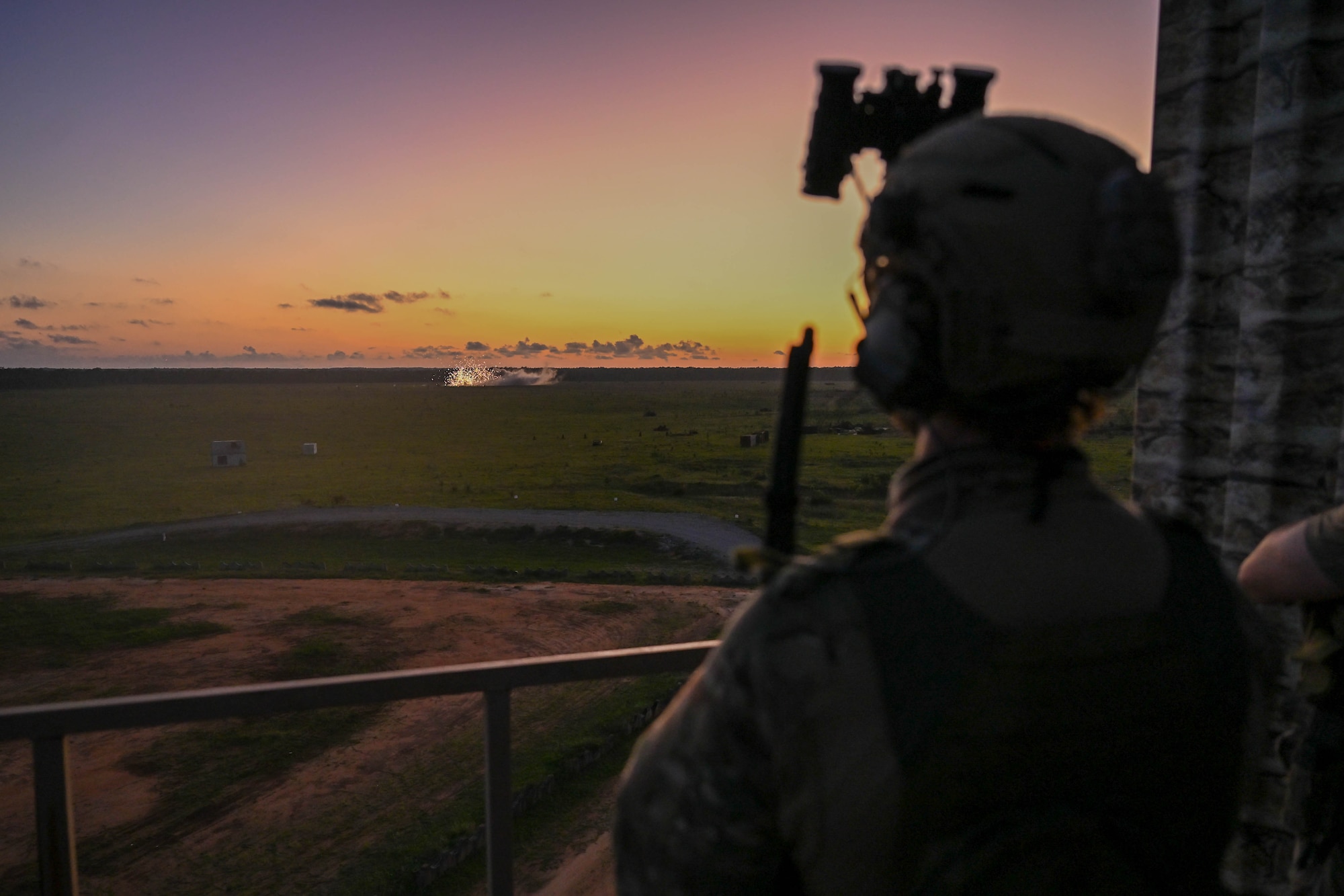 A Czech Republic special operations forces member observes an AC-130J Ghostrider strike during Emerald Warrior Spiral on Eglin Range, Florida, June 11, 2026.