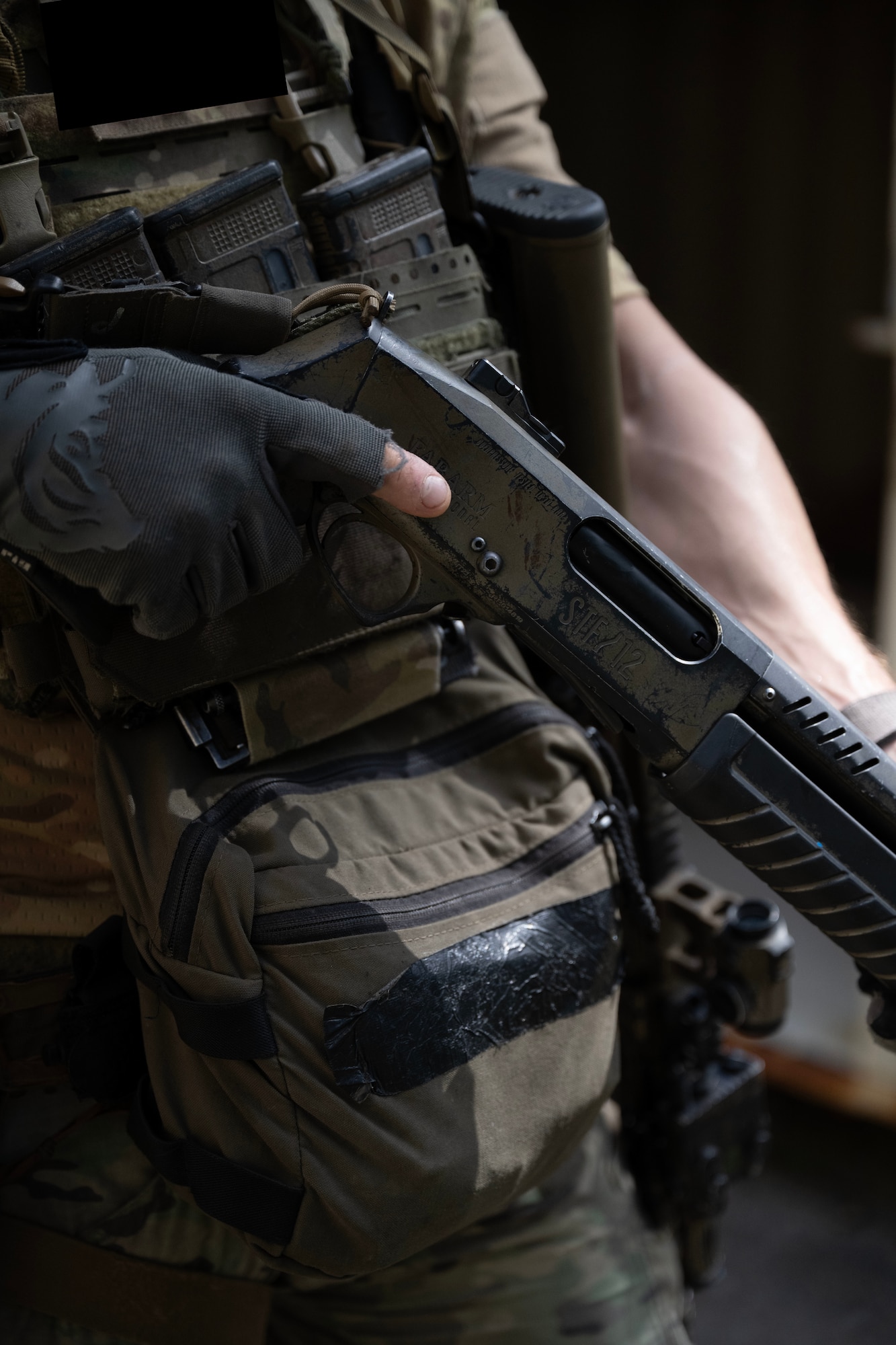 A Czech Republic special operations forces member holds a breaching shotgun at the low-ready position during close-quarters battle training during exercise Emerald Warrior Spiral at Hurlburt Field, Florida, June 8, 2026.