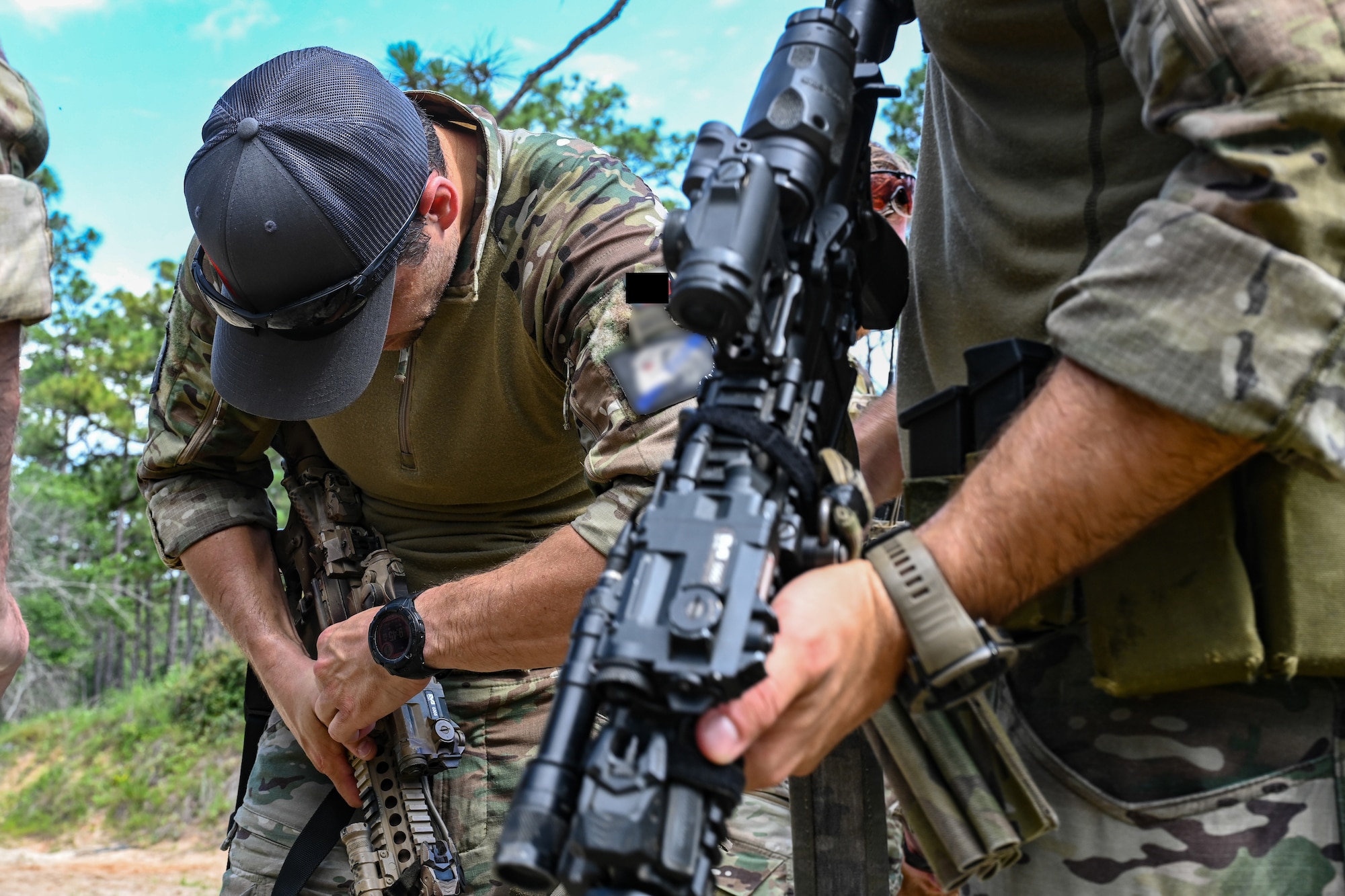 Czech Republic special operations forces members inspect their weapons during close-quarters battle training for exercise Emerald Warrior Spiral at Hurlburt Field, Florida, June 8, 2026.