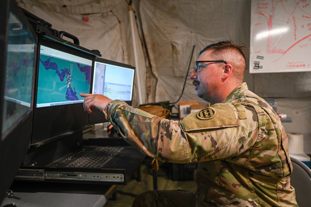 Soldier points at a monitor. (U.S. Air Force photo by Airman 1st Class Donnell Ramsey)