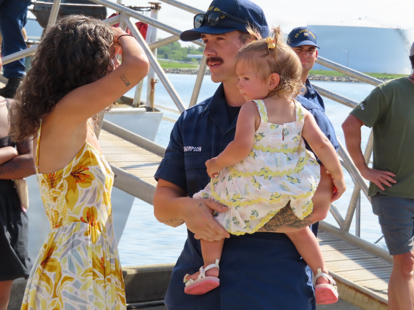 A U.S. Coast Guard member attached to Coast Guard Cutter Bear (WMEC 901) greets their family in Portsmouth, Virginia June 30, 2026. The Bear's crew deployed in support of Joint Interagency Task Force - South and conducted counter-drug missions in the Eastern Pacific. (U.S. Coast Guard photo)