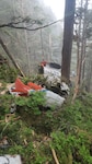 The wreckage of a Coast Guard MH-60 Jayhawk helicopter from Coast Guard Air Station Sitka is seen on Harbor Mountain in Sitka, Alaska, June 22, 2026