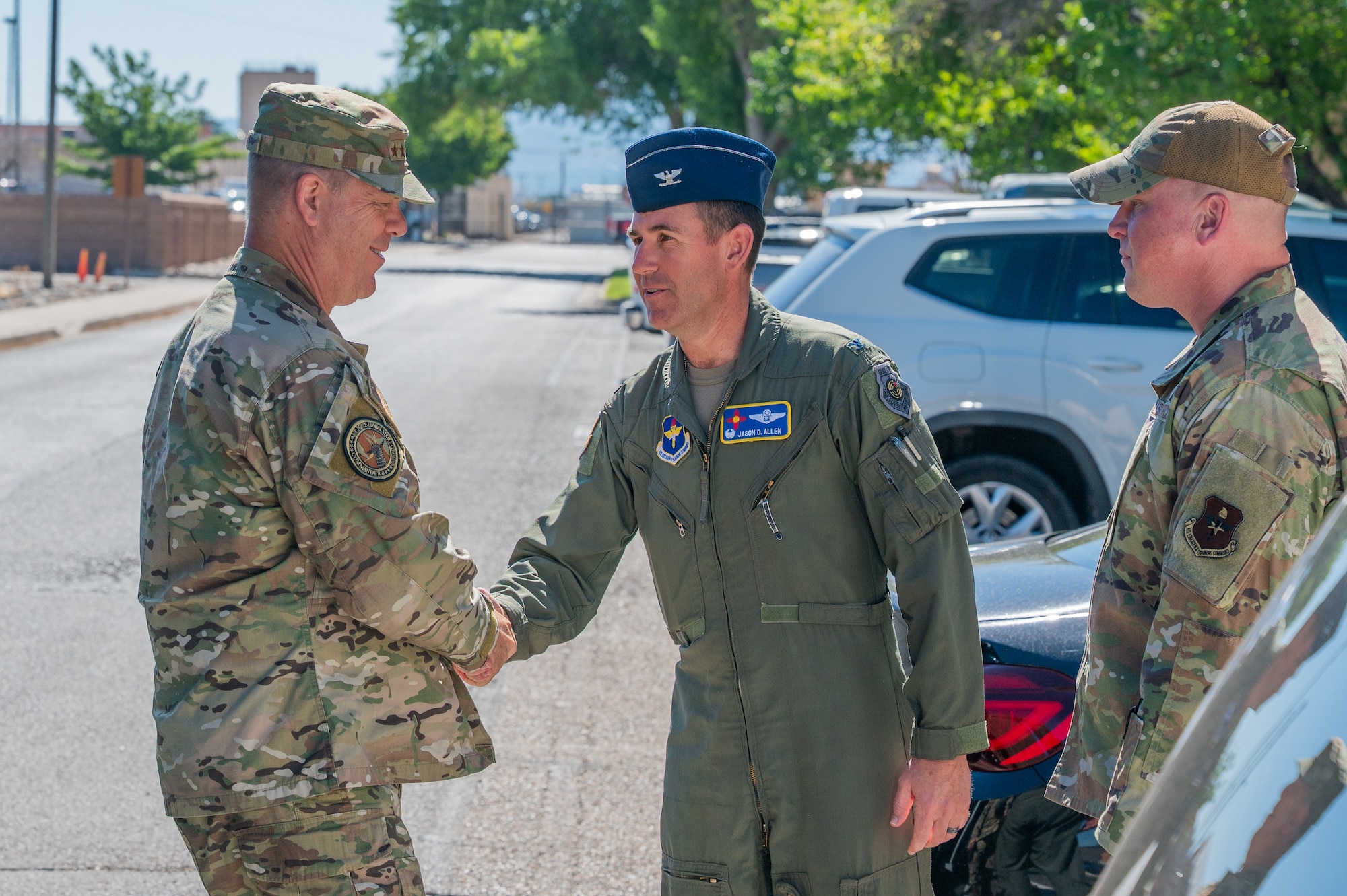 U.S. Air Force Gen. S.L. Davis, left, Air Force Global Strike Command commander, is greeted by U.S. Air Force Col. Jason D. Allen, right, 58th Special Operations Wing commander, outside of the 58 SOW headquarters on Kirtland Air Force Base, New Mexico, June 17, 2026. The visit provided Davis an opportunity to immerse himself in the 58th Special Operations Group Detachment 2’s unique mission and discuss operational priorities. Det 2 generates mission-ready pilots specifically for Air Force Global Strike Command, helping ensure the readiness, resilience, and credibility of the nation’s global strike capabilities. (U.S. Air Force photo by Senior Airman Donnell Schroeter)