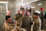 U.S. Marine Corps Maj. Gen. Kevin J. Jarrard, speaks with Bolivarian Military Aviation and 621st Contingency Response Wing personnel at Simón Bolívar International Airport, Venezuela, June 28, 2026. At the direction of U.S. Southern Command, assigned U.S. military forces are supporting Department of State-led U.S. disaster assistance to the people of Venezuela in the aftermath of the June 24, 2026, earthquakes. (U.S. Air Force photo by Tech. Sgt. Devin M. Rumbaugh)
