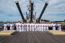 Multinational senior enlisted leaders pose for a photograph during a tour of the Battleship Missouri Memorial on Ford Island, Joint Base Pearl Harbor-Hickam, Hawaii, during Exercise Rim of the Pacific 2026, June 30, 2026.