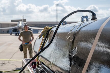 An Airman works on the flightline
