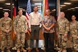 From left, Command Sgt. Maj. Mullinax; Gen. Christopher Donahue, commanding general of U.S. Army Europe and Africa; Mr. Brian Motyl; Mr. Mike Tillemas; Command Sgt. Maj. Giancarlo F. Lalor, USAREUR-AF senior enlisted leader; and Command Sgt. Maj. Malave, pose for a group photo during an awards ceremony in Wiesbaden, Germany, June 12, 2026. Motyl and Tillemas accepted the 2026 Secretary of the Army Environmental Award for Environmental Quality on behalf of the USAREUR-AF Environmental Branch, which earned the Army’s highest honor for environmental achievement. (U.S. Army photo by Mr. Marcos Perez)