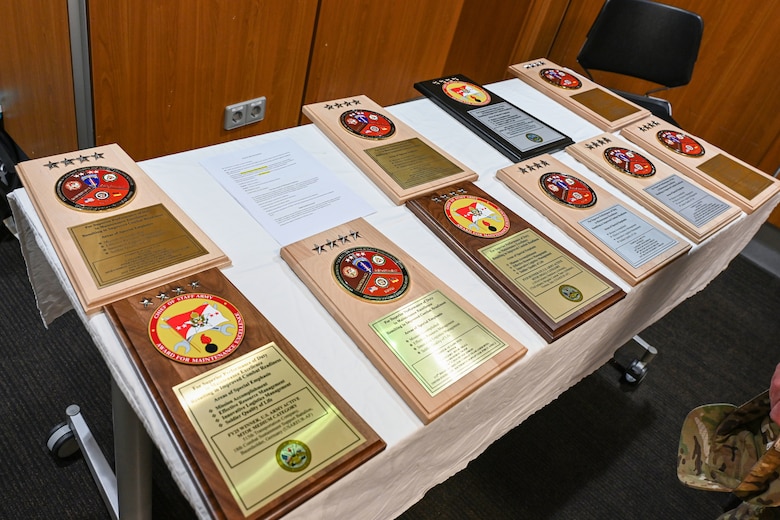 The Army Award for Maintenance Excellence "Best of the Best" plaque (left) is displayed alongside theater-level Logistics Excellence Awards and the Secretary of the Army Environmental Award during a ceremony in Wiesbaden, Germany, June 12, 2026. The "Best of the Best" award, the highest honor for maintenance in the U.S. Army, was earned by the 515th Transportation Company for fiscal year 2025, highlighting U.S. Army Europe and Africa's commitment to excellence in sustainment and readiness. (U.S. Army photo by Mr. Nathaniel Petraitis)