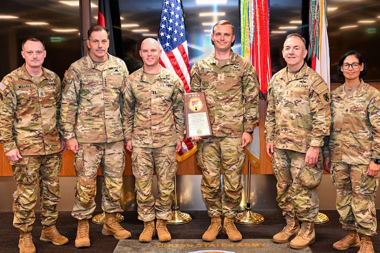 From left, Command Sgt. Maj. Mullinax; Gen. Christopher Donahue, commanding general of U.S. Army Europe and Africa; Capt. Abell; Capt. Cavinder; Command Sgt. Maj. Giancarlo F. Lalor, USAREUR-AF senior enlisted leader; and Command Sgt. Maj. Malave, pose for a photo after the 515th Transportation Company was presented a Logistics Excellence Award in the Maintenance category during a ceremony in Wiesbaden, Germany, June 12, 2026. The unit was recognized as a theater-level winner for their outstanding contributions to sustainment and readiness. (U.S. Army photo by Nathaniel Petraitis)