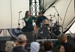 American country and pop singer Cassadee Pope, performs live during Freedom 250 at Powidz, Poland, June 30, 2026. Freedom 250 celebrates the enduring partnership between the United States and Poland through shared history, values and allied cooperation. Freedom 250 observances bring American and Polish communities together through partnership and cultural exchanges. (U.S. Army Reserve photo by Sgt. Shaun R. Rajasekar)